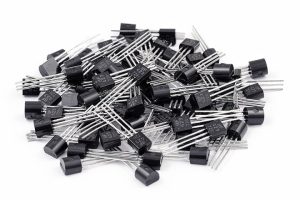 A Pile of Black Triode Transistor Used in Custom Cable Assembly